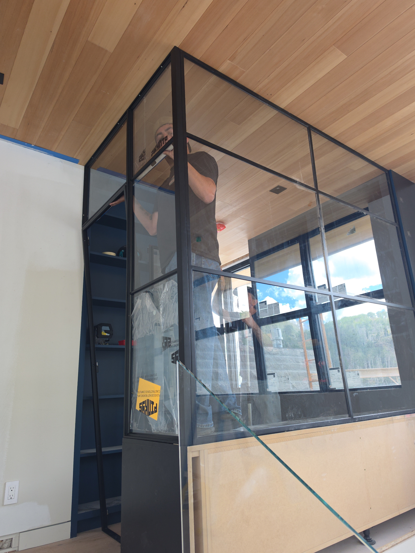 Black-framed glass office wall at a company office in the Aldasoro area near Telluride, Colorado