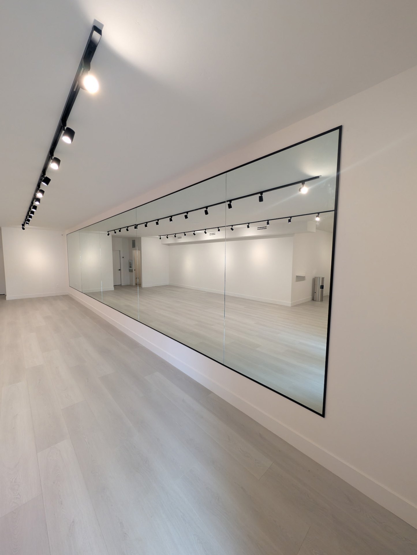 Multi-panel wall mirror at Tonic Method pilates studio in Durango, Colorado